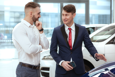 Young Businesman Buying New Automobile